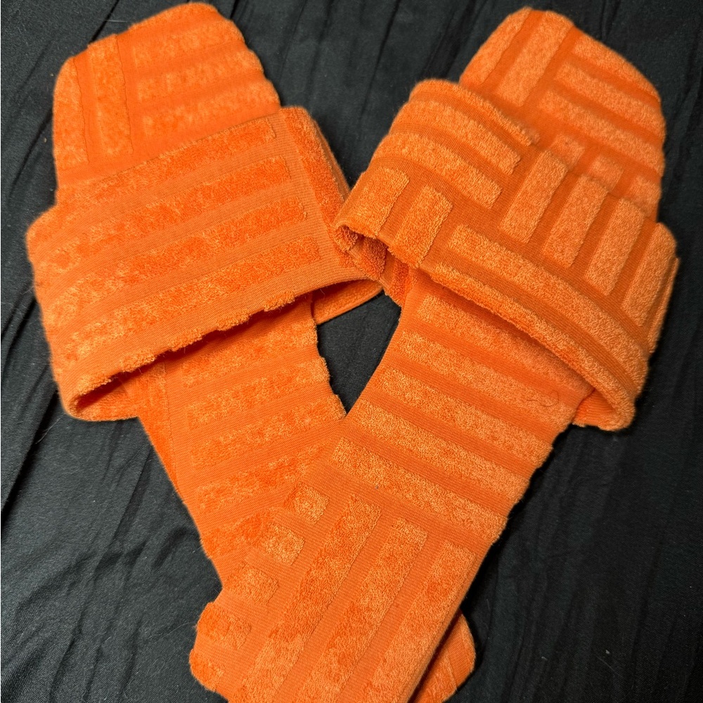Orange sandals.